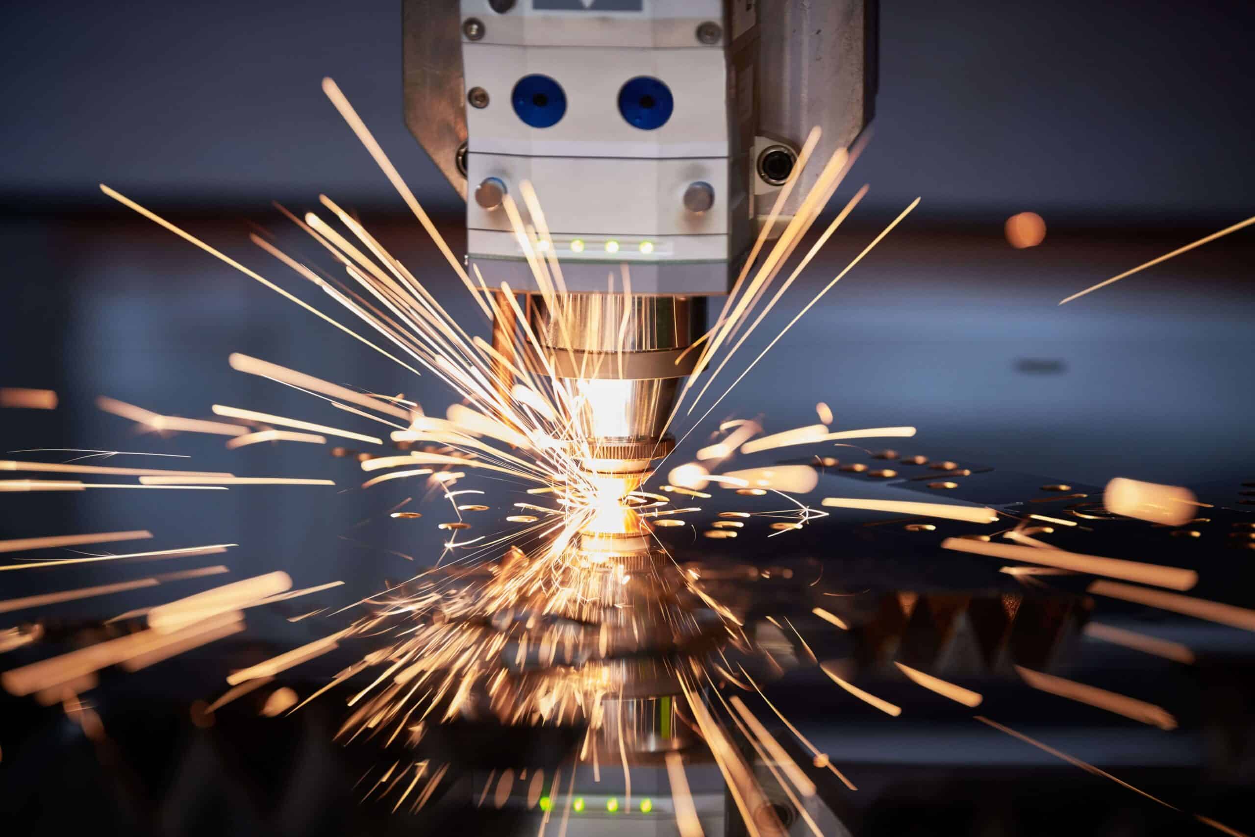 Industrial machining team working on precision manufacturing projects